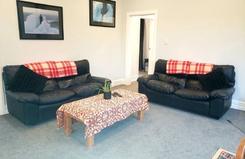 Lake Ferry Cottage | Amazing recently renovated cozy cottage, oozing both character and comfort.