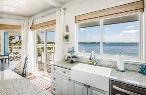 Cutthroat Harbor Estates Maison | Amazing waterfront home with private beach, dock, pool, WiFi & outdoor kitchen