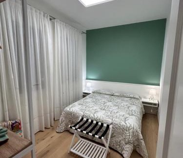 Valdobbiadene Appartement | AMIA rooms & wine