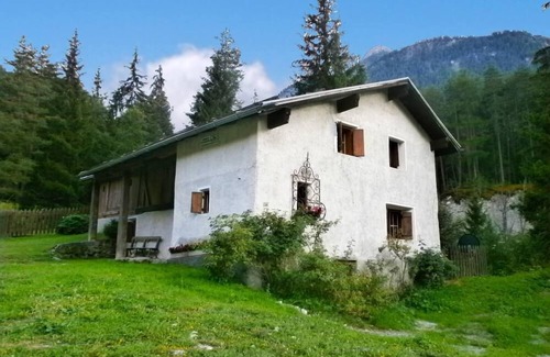 Sent Maison | Ancien moulin typique de l'Engadine tous conforts près de la forêt