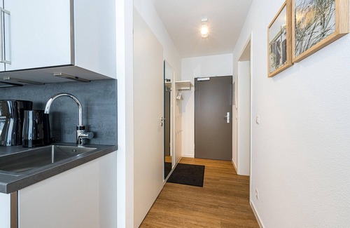 Bensersiel Appartement | Apartment Nahe der Nordsee mit Terrasse, Parkplatz, Schwimmbad- & Saunanutzung