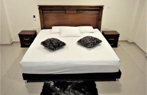 Tulua Hôtel | APARTAHOTEL LION