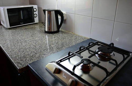 Tortella Maison | Apartamento para 8 personas 4 habitaciones y cuatro baños. Piscina COMPARTIDA.