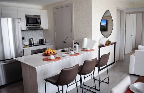 San Jose Appartement | Apartamento con Piscina y Cómodo Espacio de Trabajo
