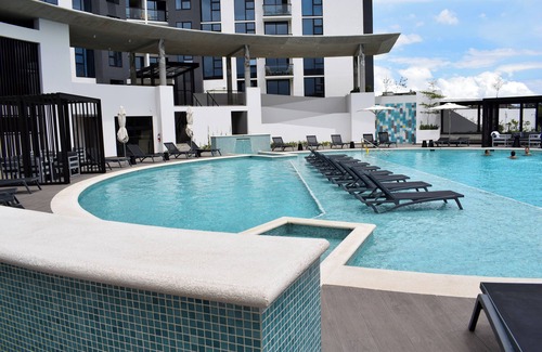 San Jose Appartement | Apartamento con Piscina y Cómodo Espacio de Trabajo