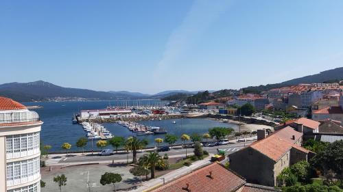 Portosin Appartement | Apartamento con vistas, ascensor y parking en Portosín