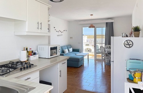 Arenal d'en Castell Appartement | Apartamento con Piscina y Solarium