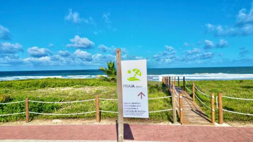 Parafuso Appartement | Apartamento Pé na Areia Cond Alphaville Guarajuba