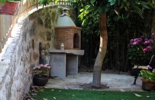 San Adrian de Cobres Cottage | Maison en bois pour 4 personnes avec vue sur la Ría de Vigo, jardin avec barbecue.
