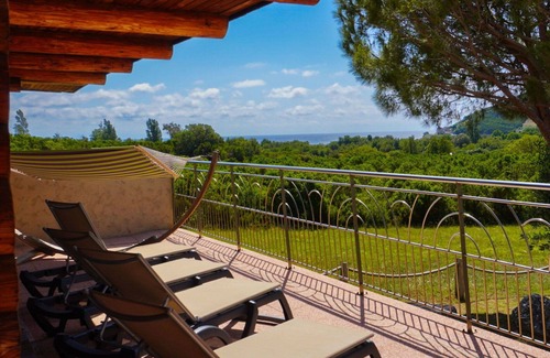 Pietracorbara Maison | Apartment in villa with pool, A/C, WIFI, TV, terrace, pets allowed, panoramic view, parking