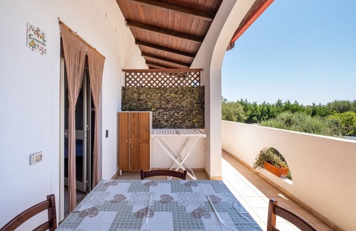 Maruggio Appartement | Appartement 'Marubium - Commenda' avec piscine partagée, Wi-Fi et climatisation