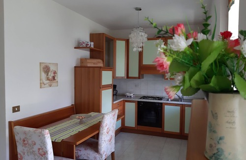 Assenza Appartement | Appartement avec vue sur le lac, piscine, garage et jardin privé