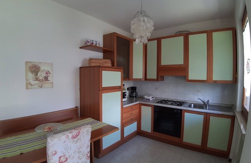 Assenza Appartement | Appartement avec vue sur le lac, piscine, garage et jardin privé