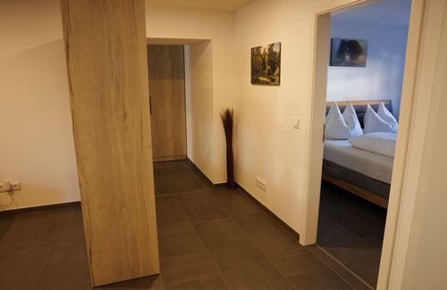 Aua Appartement | Apartment 'Alter Kuhstall' with Private Terrace and Wi-Fi