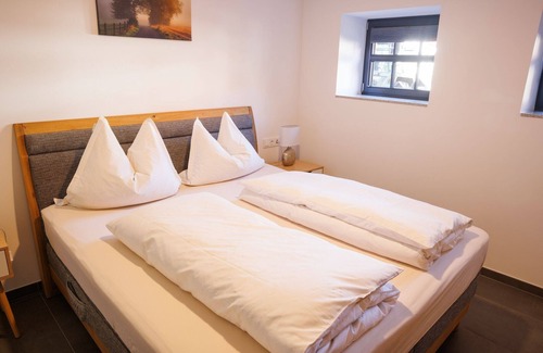 Aua Appartement | Apartment 'Alter Kuhstall' with Private Terrace and Wi-Fi