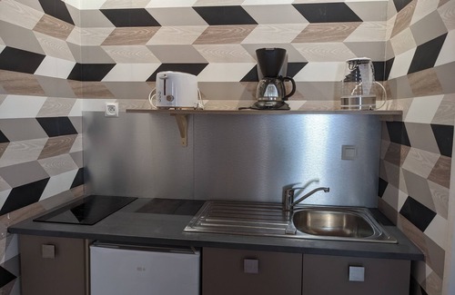 Saint-Claude Appartement | Appartement et salle de jeu