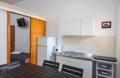 Cocumola Appartement | Apartment 'Angeli Nel Salento - Casa Vacanza 1' with Shared Terrace, Wi-Fi and Air Conditioning