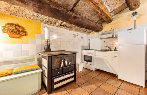 Ala Appartement | Appartement 'Appartamento Del Vecchio Fienile' avec vue sur les montagnes et jardin partagé