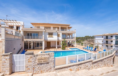 Cala Figuera Appartement | Appartement 'Apto Villa Sirena Vista Piscina' avec piscine partagée, Wi-Fi et climatisation