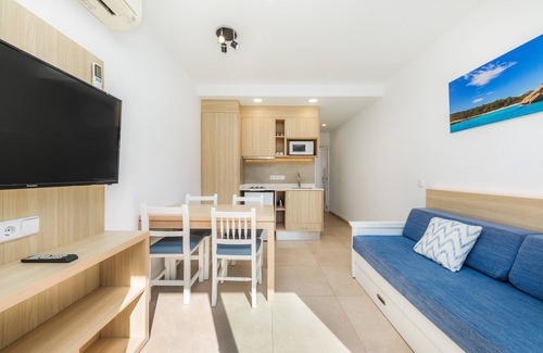 Cala Ferrera Appartement | Appartement 'Aquamarina 3' avec piscine partagée, Wi-Fi et climatisation.