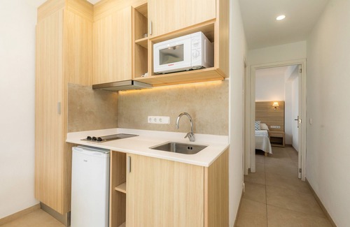 Cala Ferrera Appartement | Appartement 'Aquamarina 3' avec piscine partagée, Wi-Fi et climatisation.