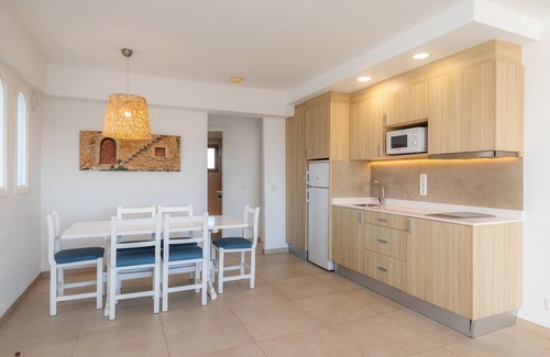 Cala Ferrera Appartement | Appartement 'Aquamarina 7' avec piscine partagée, Wi-Fi et climatisation.