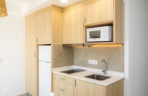 Cala Ferrera Appartement | Appartement 'Aquamarina 8' avec piscine partagée, Wi-Fi et climatisation.