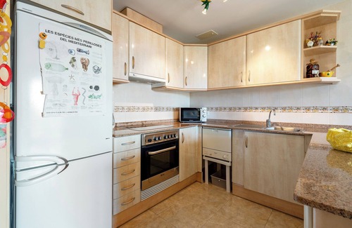 L'Ampolla Appartement | Appartement 'Cap Roig, Appartement Duplex' avec piscine partagée, terrasse privée et balcon