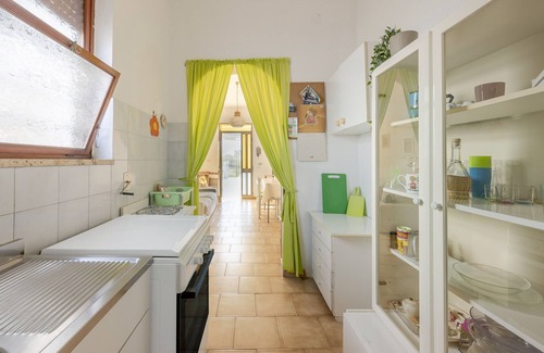 Roca Vecchia Appartement | Appartement 'Casa Eleonora' avec terrasse privée, jardin privé et climatisation