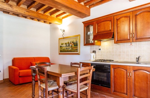 La Pesta Appartement | Appartement "Casa Vacanza Il Carpignone 5" avec vue sur le lac, piscine partagée et jardin