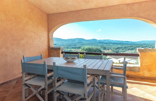 Porto Pollo Appartement | Appartement 'Casa Lauretta' avec vue sur la mer, piscine partagée et climatisation