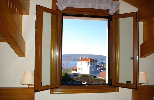 Requias Appartement | Appartement 'Casa Requias 2' avec vue sur le lac, jardin partagé et Wi-Fi