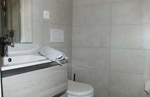 Bissone Appartement | Apartment Charming Gardenview App- 102 by Interhome