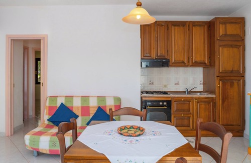 Barrabisa Appartement | Appartement "Conchiglia Rosa" avec jardin partagé, vue sur la mer et Wi-Fi