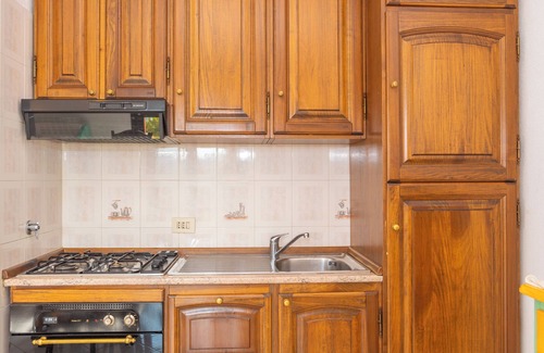 Barrabisa Appartement | Appartement "Conchiglia Rosa" avec jardin partagé, vue sur la mer et Wi-Fi