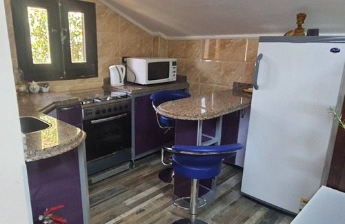Giza Maison | Appartement duplex avec jardin privé, vue sur les palmiers, à 4 km du Sphinx.