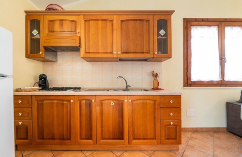 Porto Pino Appartement | Appartement 'Ella' avec terrasse privée, jardin privé et balcon
