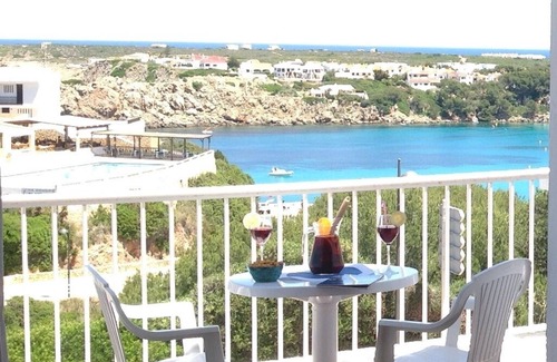 Arenal d'en Castell Appartement | Apartment located 2 minutes walk from the beach with beautiful sea views!