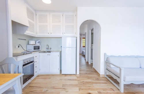 Sant Jaume Mediterrani Appartement | Apartment 'Son Bou Gardens Deluxe 1' with Shared Pool, Wi-Fi and Air Conditioning