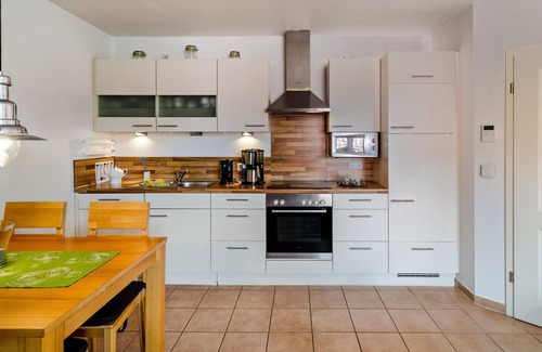 Norddeich Appartement | Appartement "Ferienwohnung Neue Sande" avec jardin privé, balcon et Wi-Fi
