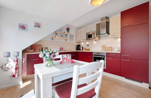 Deinste Appartement | Appartement 'Fewo Birkenallee - Rose' avec terrasse privée, jardin privé et Wi-Fi