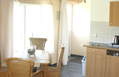 Putbus Appartement | Apartment for max. 5 people in nature and yet central garden and pool