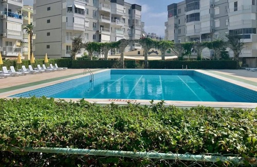 Tosmur Belediyesi Appartement | Apartment for rent directly on your own private beach + pool