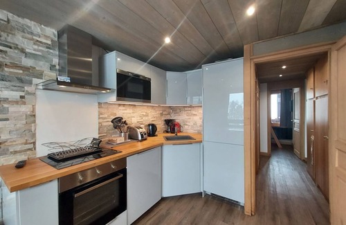 Belle Plagne Appartement | Appartement 4-6p Belle Plagne, skis aux pieds, vue montagne, ensoleillé