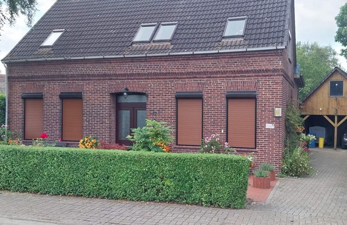 Oberhammelwarden Appartement | Appartement - Haus Am Diek - directement sur la piste cyclable de la Weser