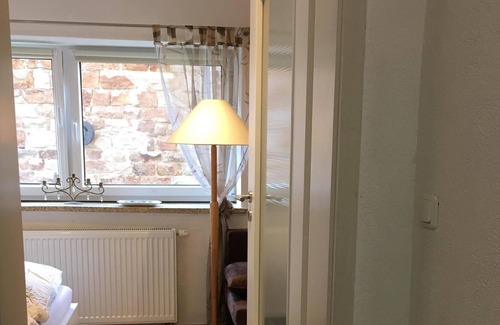 Aerzen Appartement | Appartement dans une cour avec des ânes