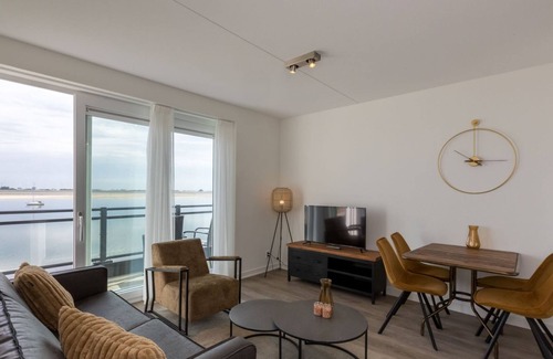 Sint-Annaland Appartement | Appartement dans un endroit unique avec vue sur le port de plaisance et l'Escaut