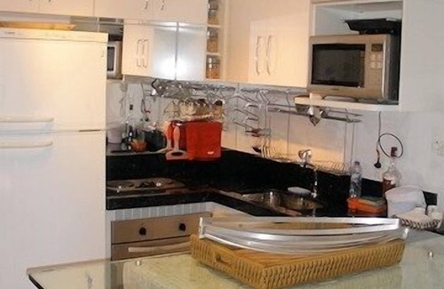 Enseada Copropriété | Appartement en copropriété de style polynésien face à la mer - 1 suite