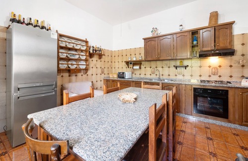 San Giovanni Suergiu Appartement | Appartement "2" avec jardin partagé, balcon et climatisation