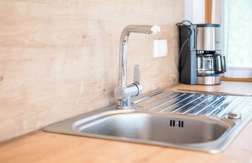 Naz Appartement | Appartement "Klementhof App Nr 1" avec vue sur les montagnes, piscine, Wi-Fi, balcon et jardin
